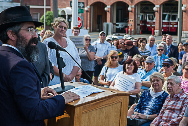 Rabbi Nechamia Schusterman speaks